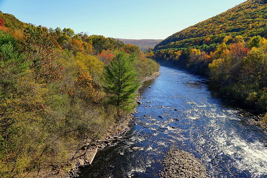 Williamsport, PA Insurance - The Wide Susquehanna River Rushing Between Two Mountains in Autumn